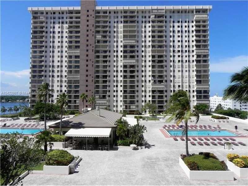 Pool deck with 2 pools, ocean and intra coastal views and a restaurant for your convenience.