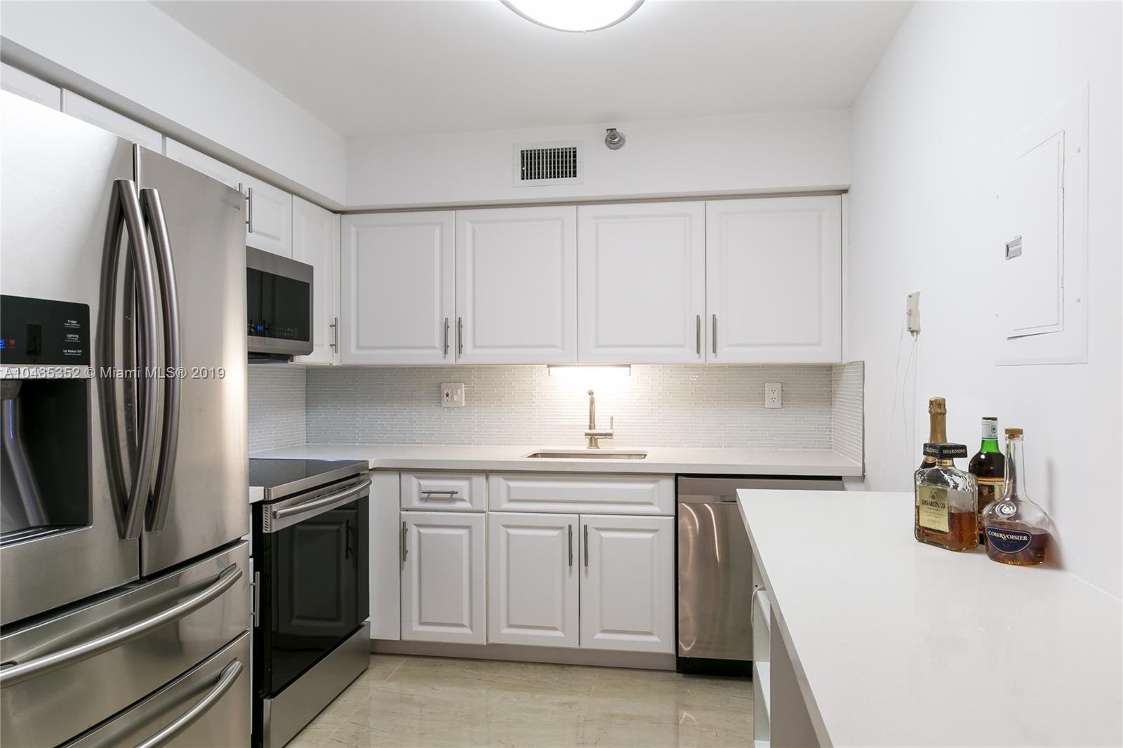 Large and remodeled kitchen. Quartz counter top, new cabinet doors, new appliances.