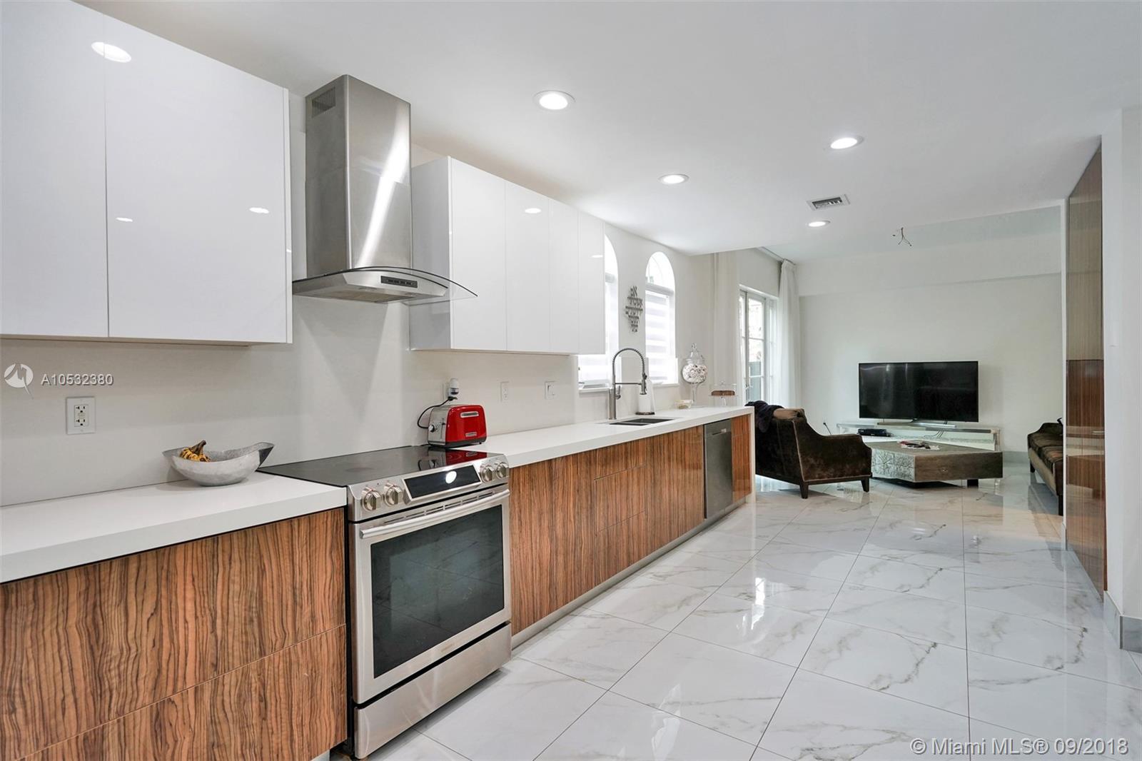 RENOVATED MODERN KITCHEN WITH OPEN FAMILY ROOM AND LIVING AREA!!!  ROOM TO BUILD A KITCHEN BREAKFAST COUNTER!
