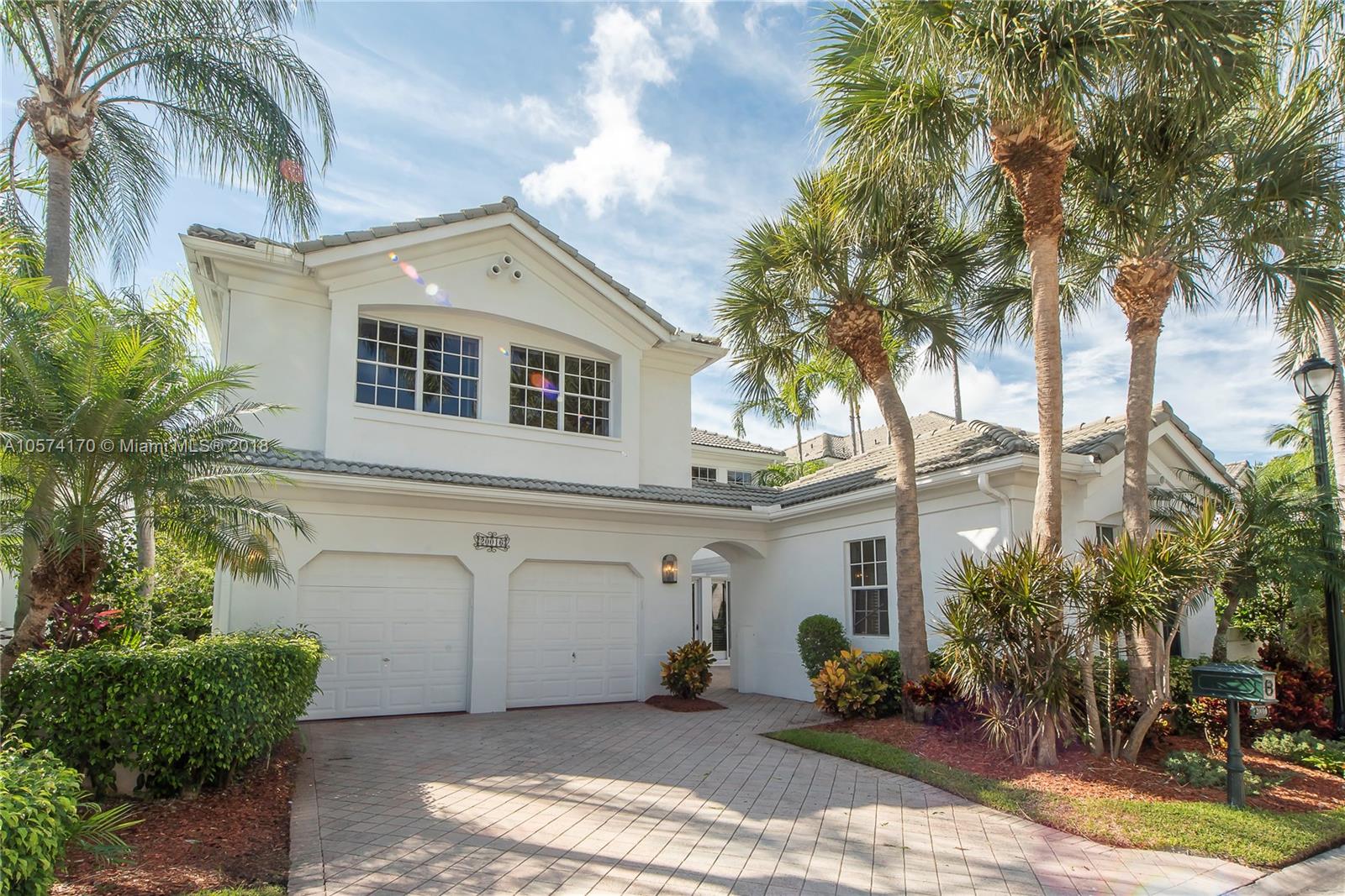 Front driveway with a full two car garage & guests parking right outside of home.