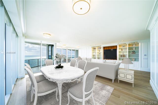 Photo of 10225 Collins Ave #901, Bal Harbour, Florida, 33154 - Digitally staged dining and living room.