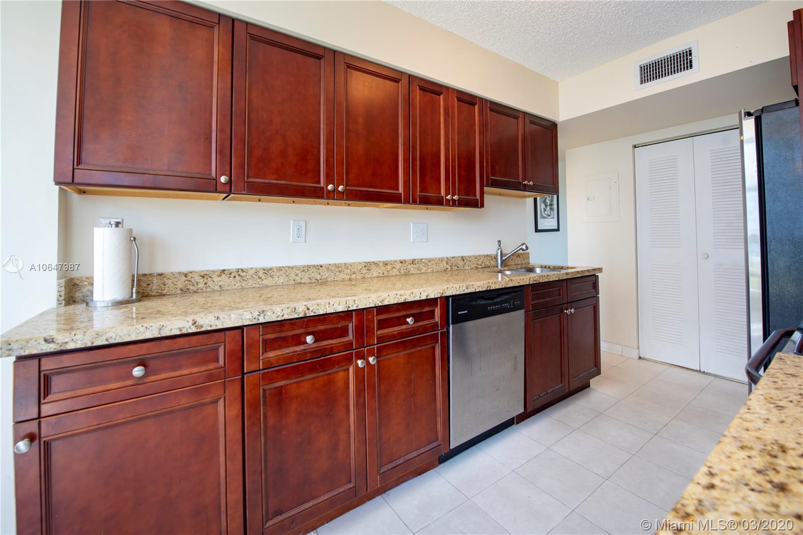 Photo of 3400 192nd St #704, Aventura, Florida, 33180 - Capacious and remodeled kitchen with new stainless steel appliances.