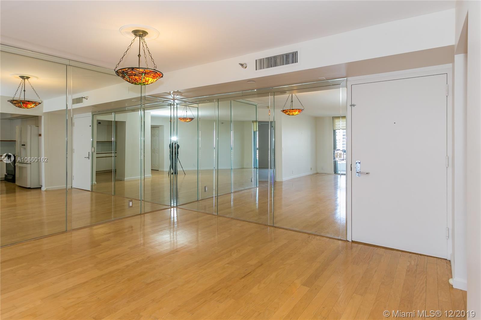 Photo of 3500 Mystic Pointe Dr #1607, Aventura, Florida, 33180 - Very large and spacious living room area.