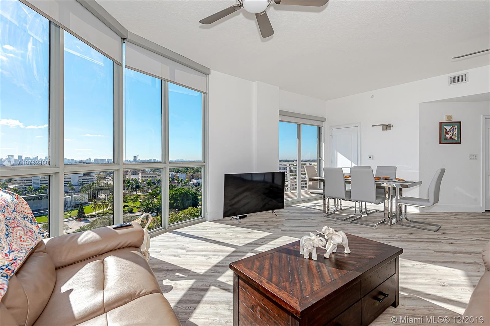 DINING/LIVING ROOM WITH SPECTACULAR VIEW TO CITY