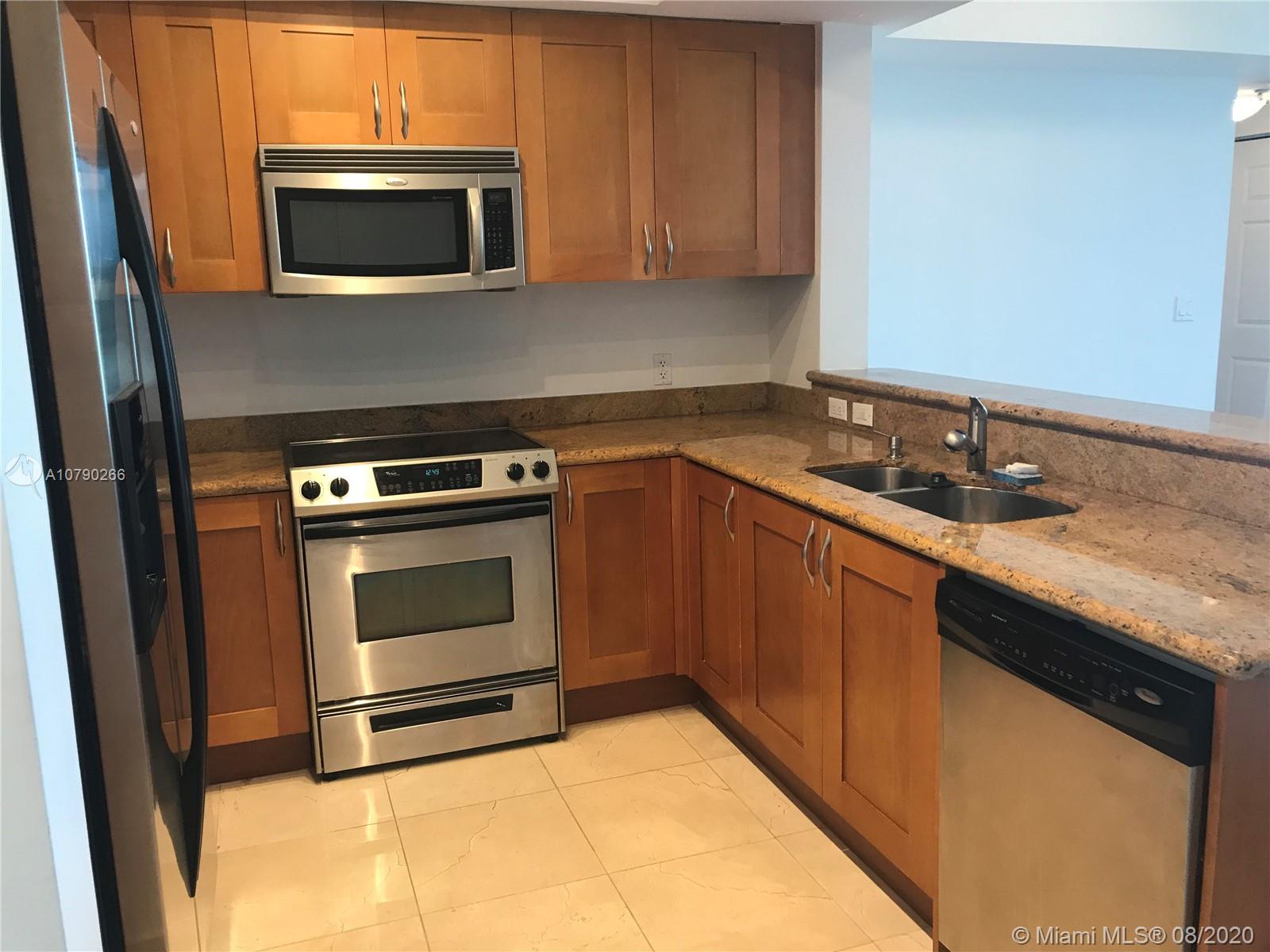 Photo of 1745 Hallandale Beach Blvd #201W, Hallandale Beach, Florida, 33009 - KITCHEN - S/S APPLIANCES & GRANITE COUNTER TOPS