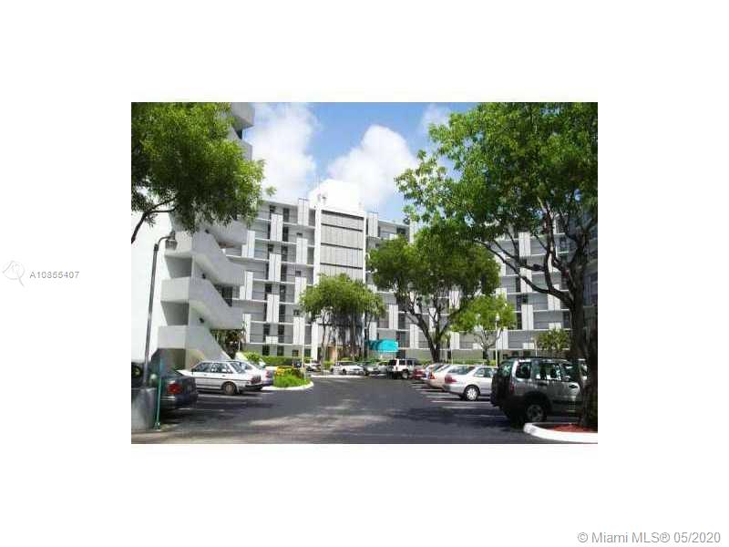 EXTERIOR FRONT &amp; PARKING LOT