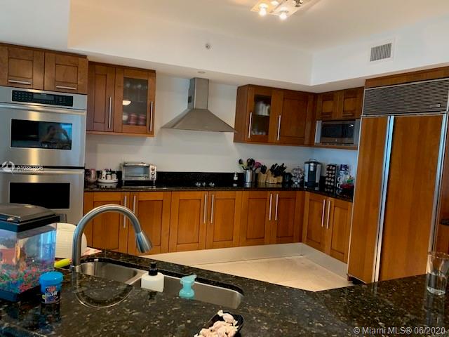 Photo of 3301 183rd St #801, Aventura, Florida, 33160 - View on a cloudy day.