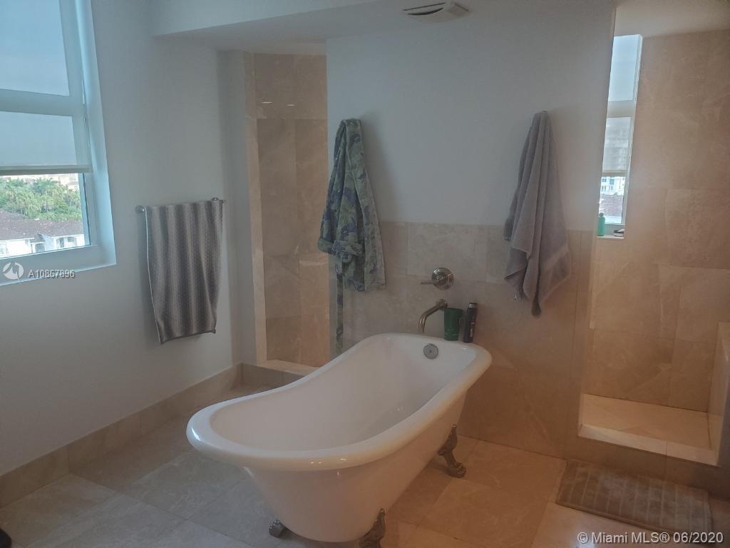 Photo of 3301 183rd St #801, Aventura, Florida, 33160 - Master bedroom with water views.