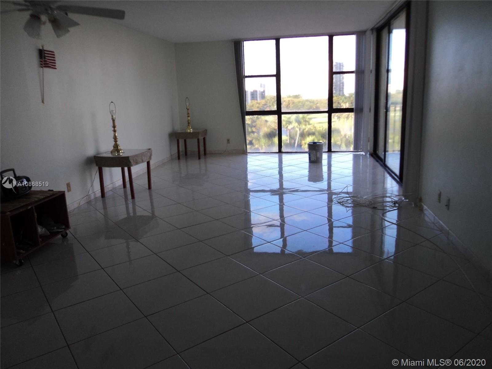 Photo of 20301 Country Club Dr #623, Aventura, Florida, 33180 - Large Living Room Almost 30 Feet Long . All Rooms have a view to the golf course.