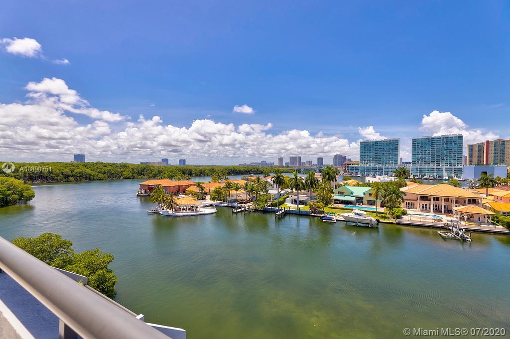 Photo of 425 Poinciana Island Drive #1444, Sunny Isles Beach, Florida, 33160 - Floor to ceiling glass windows pass through to grand terrace overlooking the Intercoastal water way and tranquil Oleta River State Park