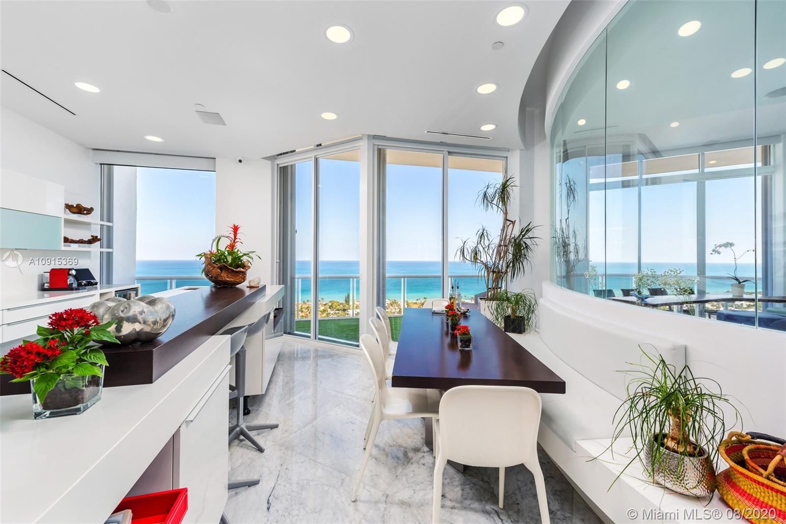 Photo of 3802 207th St #2902, Aventura, Florida, 33180 - Ample and bright white Poggenpohl kitchen with Miele, Wolf appliances and Sub Zero refrigerator