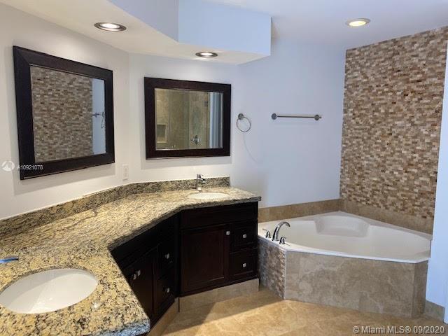 Photo of 21009 31st Ave, Aventura, Florida, 33180 - Master Bathroom - Upgraded - Plenty of Natural Light - Balcony - Tub - Double Sink - Rain Shower