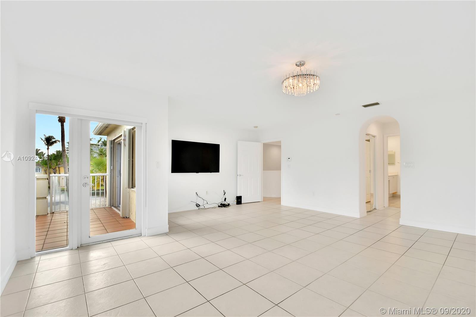 Photo of 20895 30th Pl, Aventura, Florida, 33180 - Master bedroom with balcony and NO CARPETS