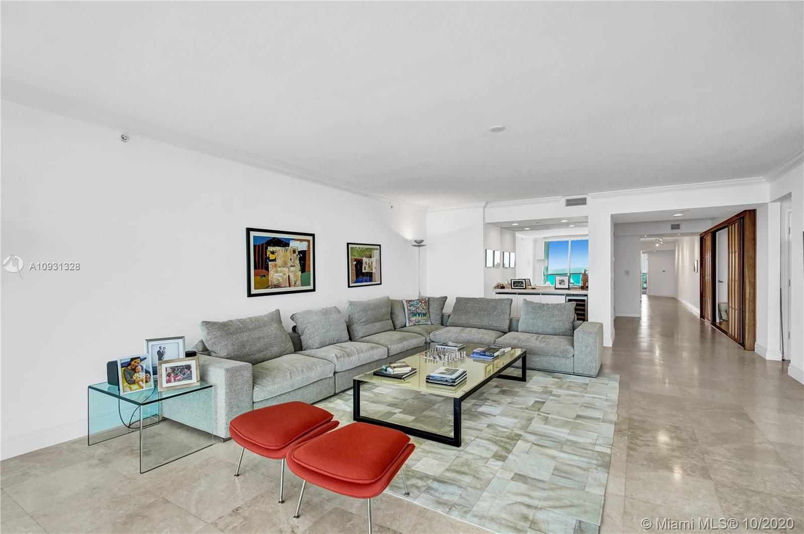 Photo of 20201 Country Club Dr #2407, Aventura, Florida, 33180 - Living and dining room facing the ocean.
