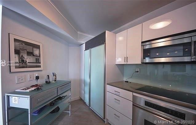 Photo of 500 Three Islands Blvd #127, Hallandale Beach, Florida, 33009 - OPEN CONCEPT LIVING AREA AND KITCHEN