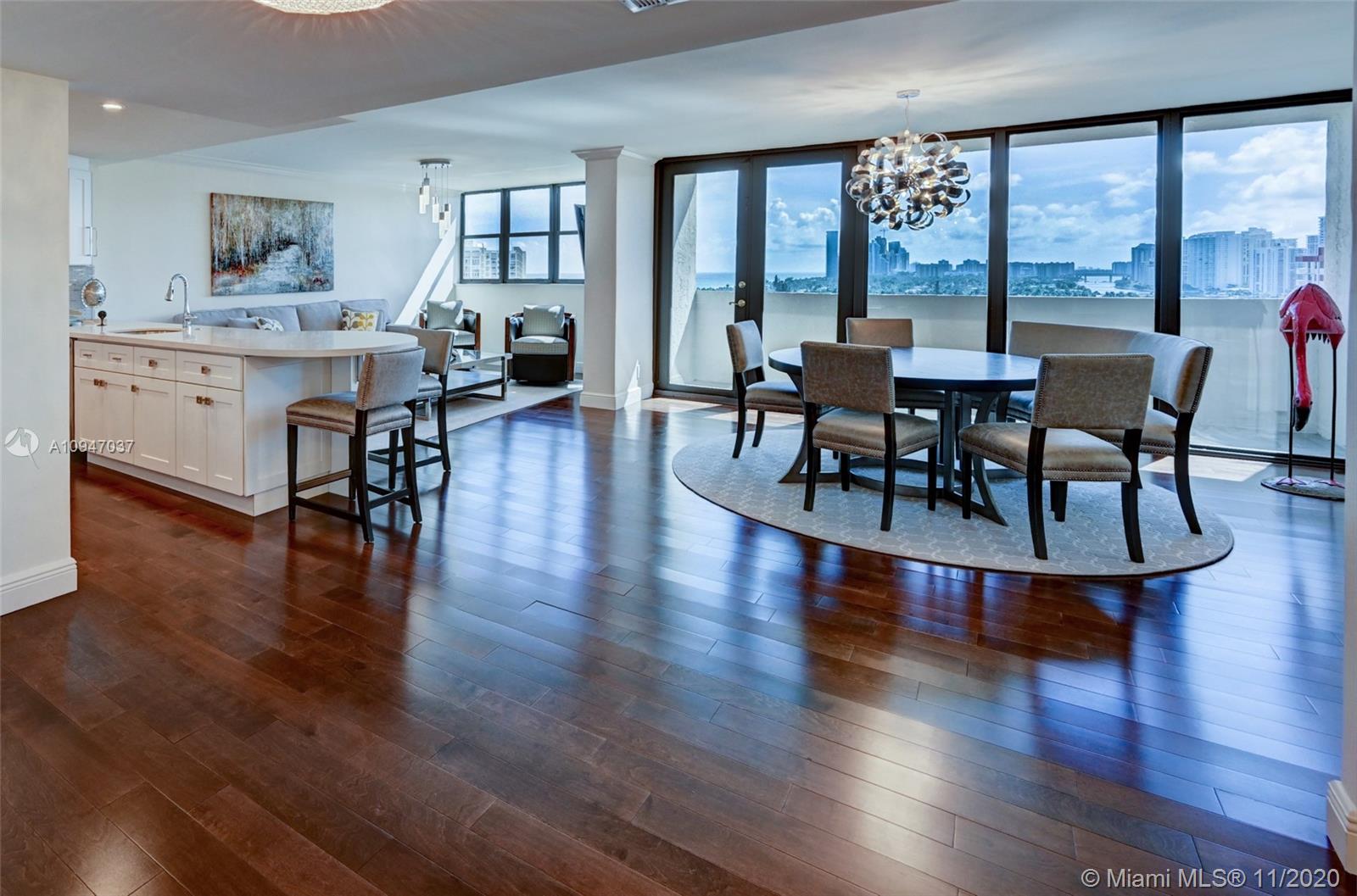Open concept Living room, Dining room & Kitchen with stunning Views of the Ocean , Sky Line and Intracoastal Water ways