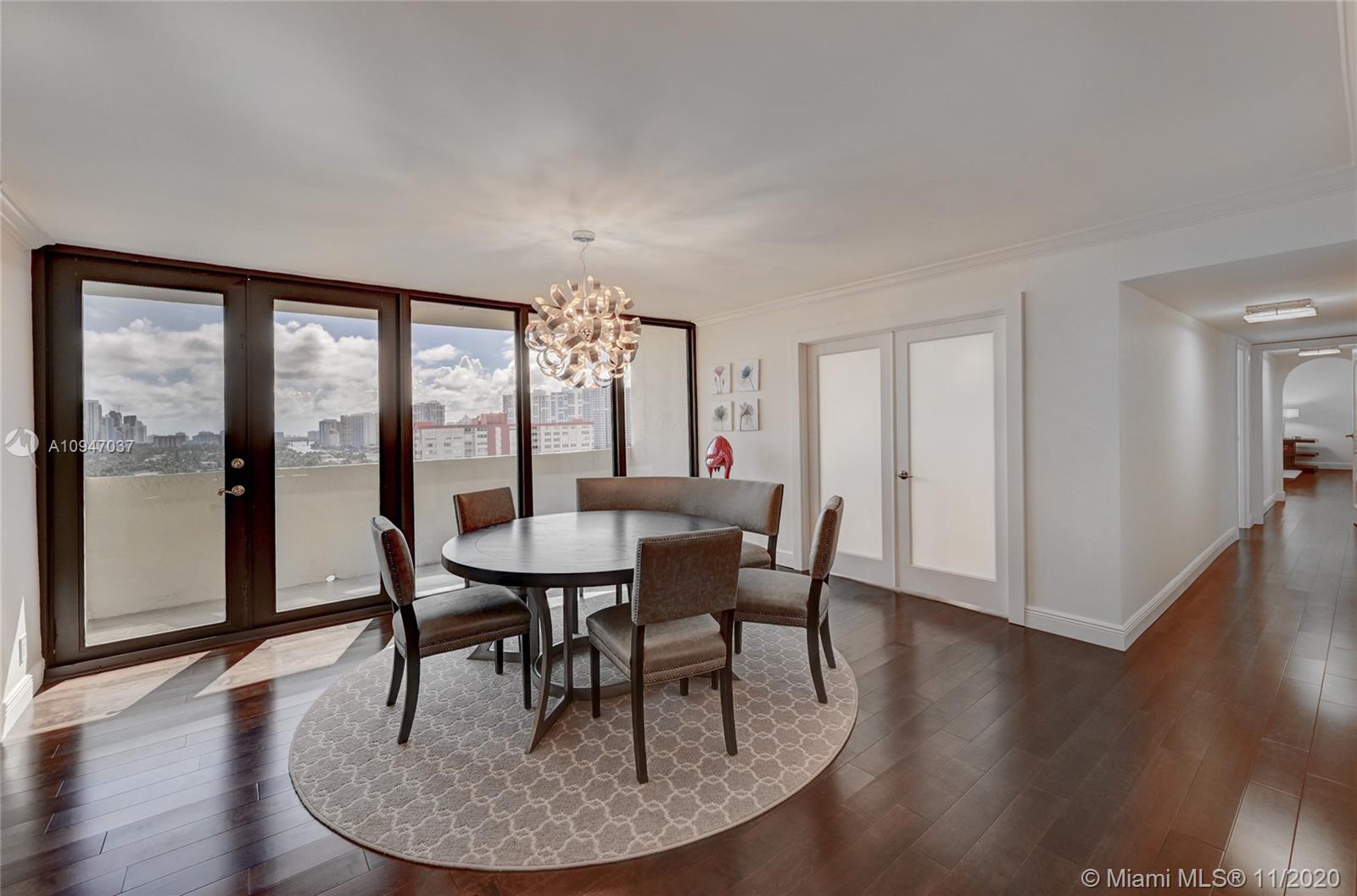 Photo of 2049 Ocean Dr #PH5, Hallandale Beach, Florida, 33009 - Dining room & Living room with floor to ceiling windows and gorgeous views
