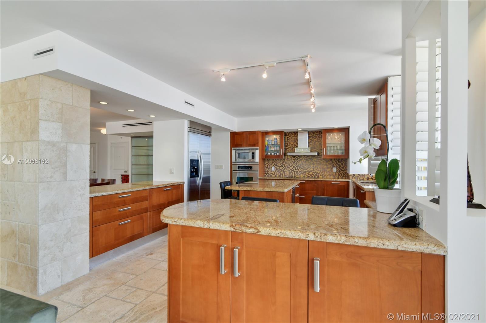 Photo of 9801 Collins Ave #4Z Direct Ocean, Bal Harbour, Florida, 33154 - Beautiful open Modern illuminated kitchen looking the ocean views sunrise
