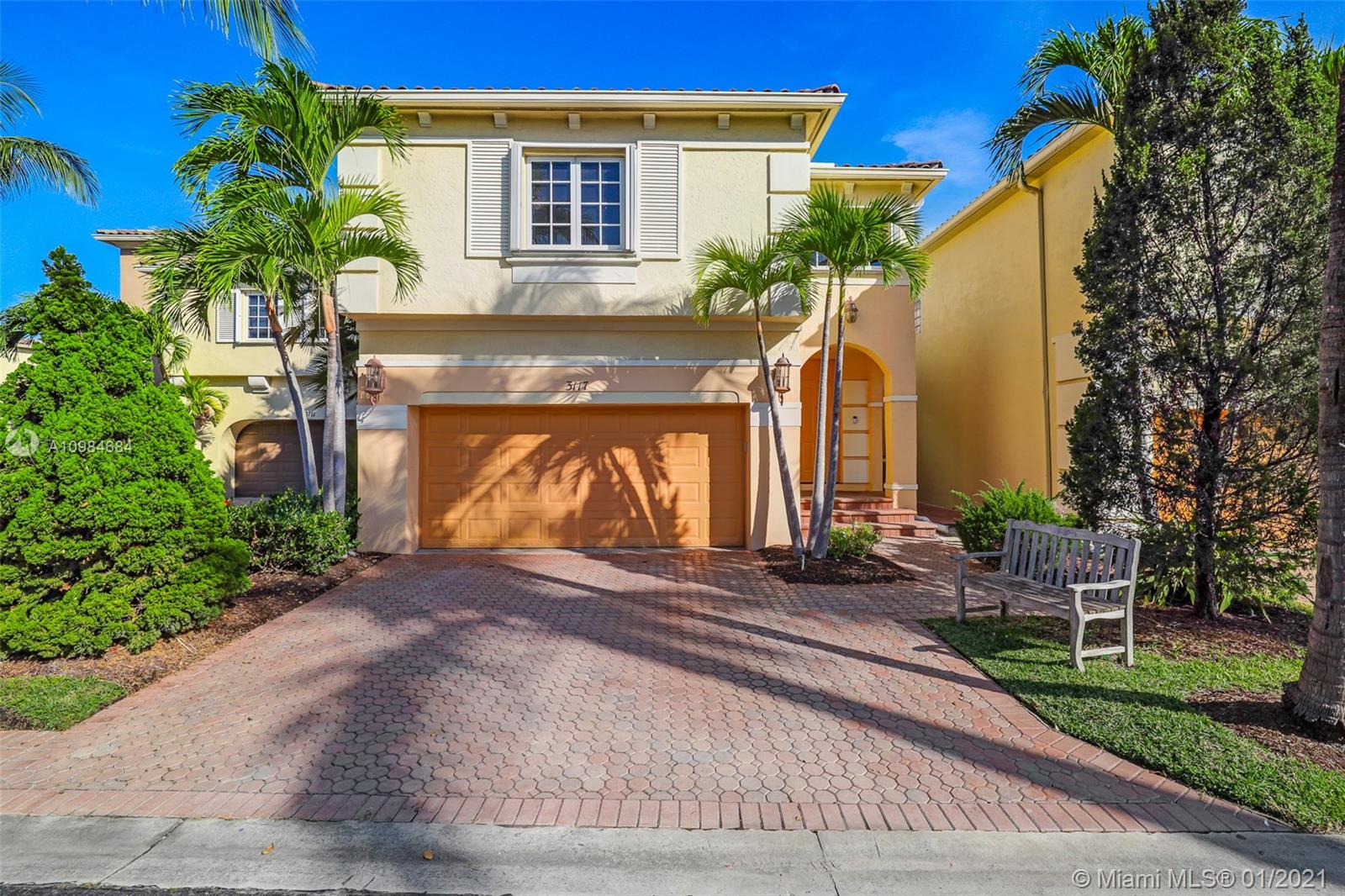 Large paved driveway can accommodate two large SUV's