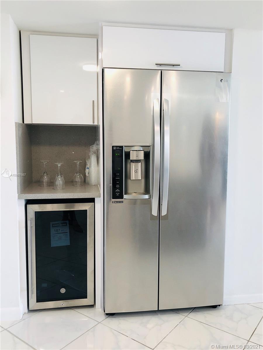 Photo of 3800 Ocean Dr #410, Hollywood, Florida, 33019 - STUNNING MODERN OPEN KITCHEN SEATS 4