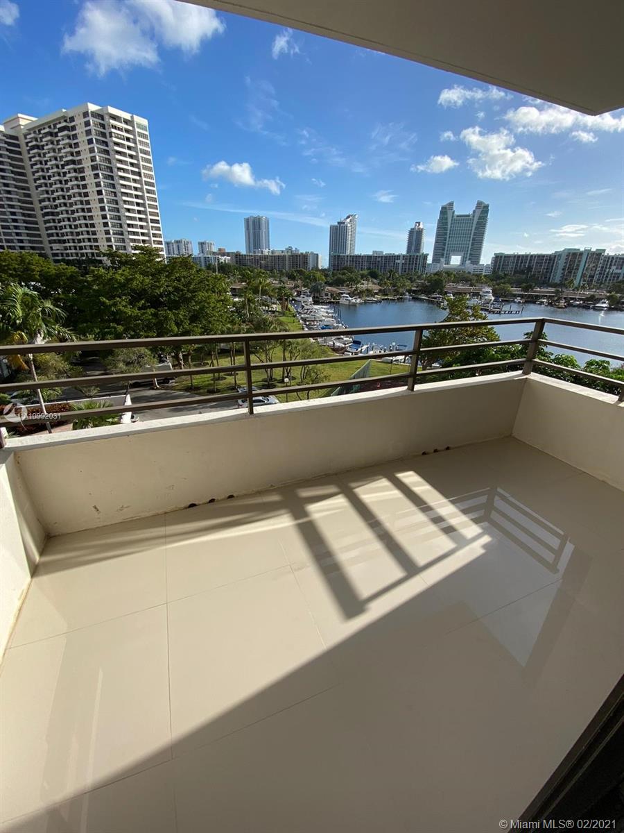 Photo of 500 Three Islands Blvd #223, Hallandale Beach, Florida, 33009 - Balcony view, Tennis Court and water view
