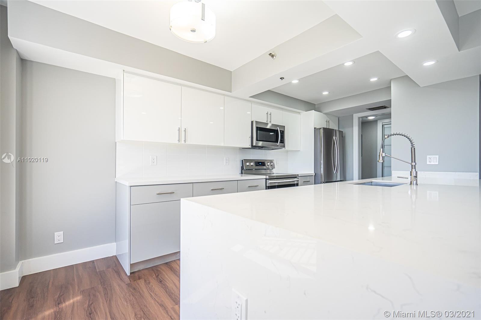 Photo of 300 Three Islands Blvd #602, Hallandale Beach, Florida, 33009 - Be the first to use this beautifully renovated kitchen with abundant cabinets and quartz counters