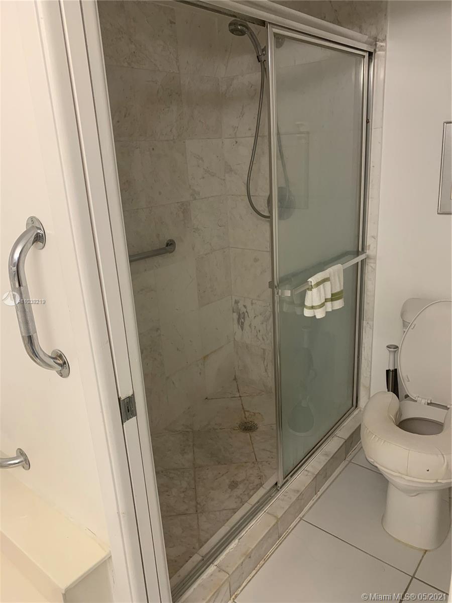 Photo of 19195 Mystic Pointe Dr #907, Aventura, Florida, 33180 - Tennis Courts just footsteps away