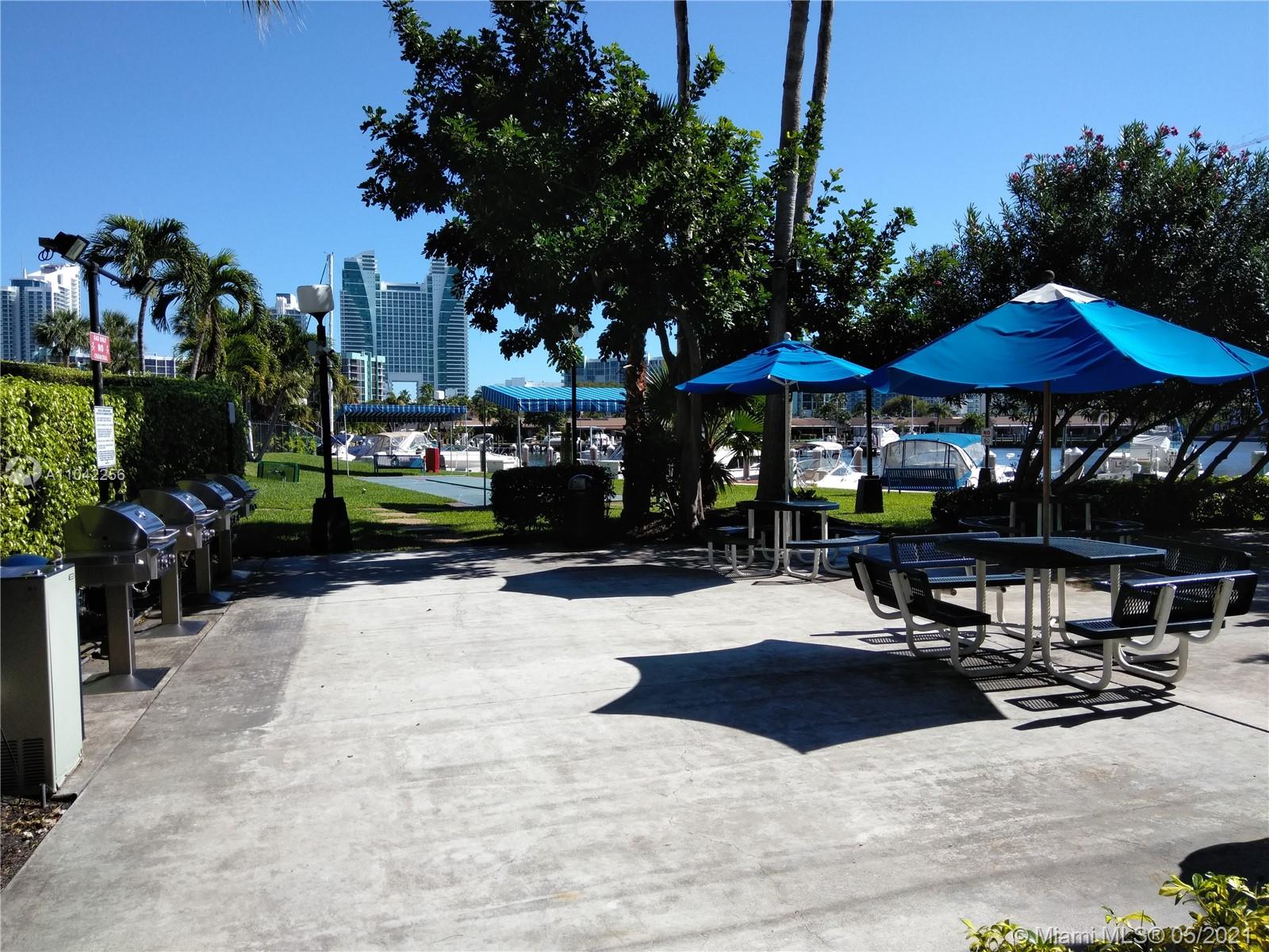 Photo of 500 Three Islands Blvd #410, Hallandale Beach, Florida, 33009 - Paved walkways surround this community's three towers.