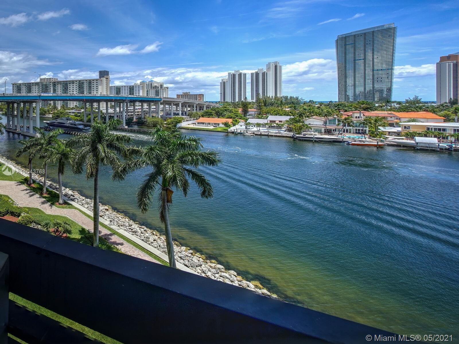 Photo of 19195 Mystic Pointe Dr #709, Aventura, Florida, 33180 - Living room & balcony view