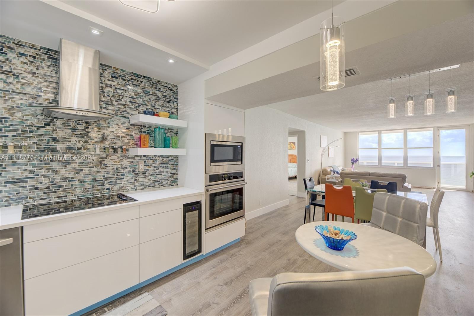 Photo of 3725 Ocean Dr #601, Hollywood, Florida, 33019 - KITCHEN TO DINING ROOM