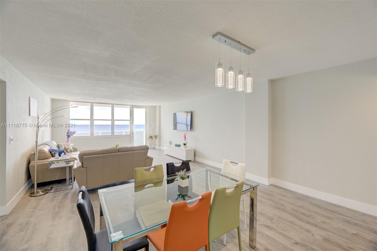 Photo of 3725 Ocean Dr #601, Hollywood, Florida, 33019 - DINING ROOM TO LIVING ROOM