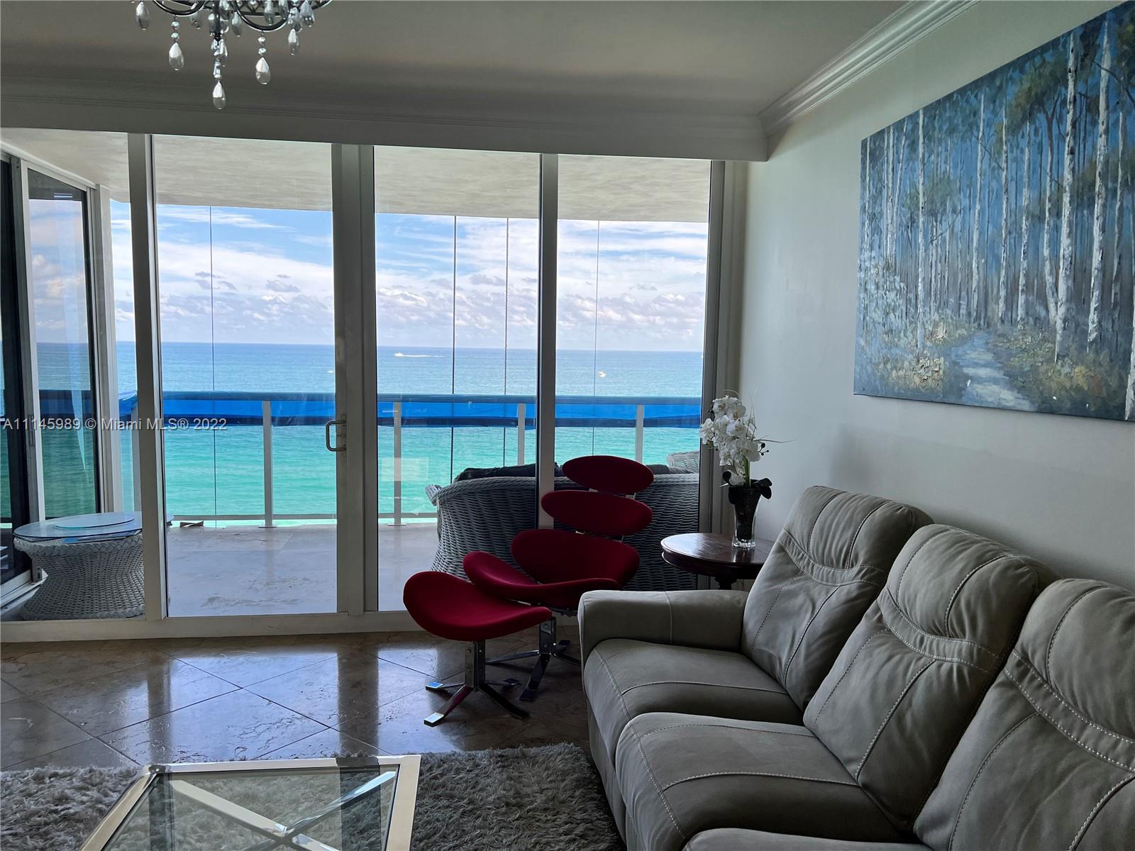 Living room with Direct Ocean Views