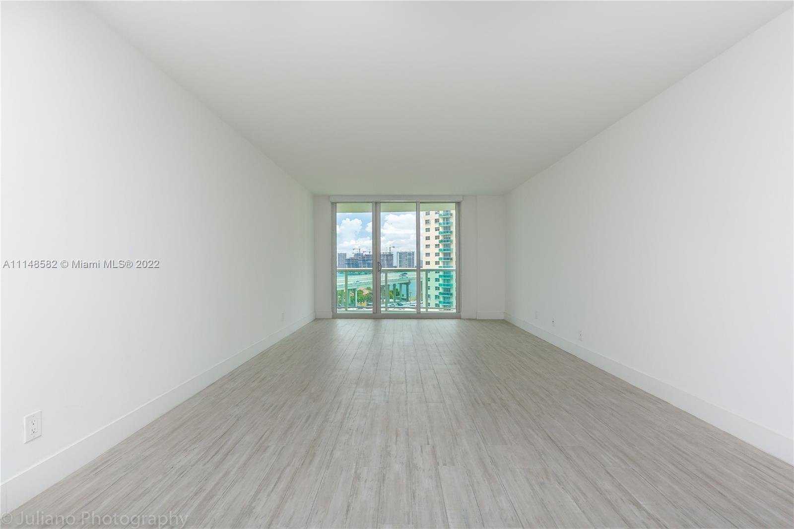 Photo of 19380 Collins Ave #919, Sunny Isles Beach, Florida, 33160 - HUGE LIVING ROOM WITH DIRECT PANORAMIC WATER VIEW AND SKYLIGHTS