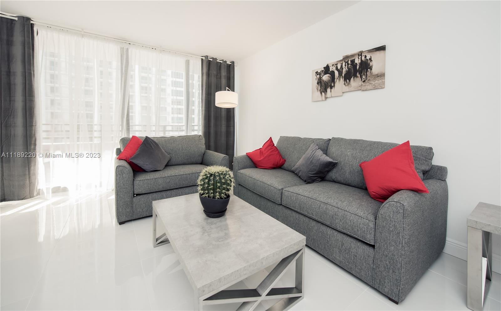 Photo of 3505 Ocean Dr #1019, Hollywood, Florida, 33019 - LIVING ROOM/W SLEEPER SOFA AND THE SLEEPER CHAIR