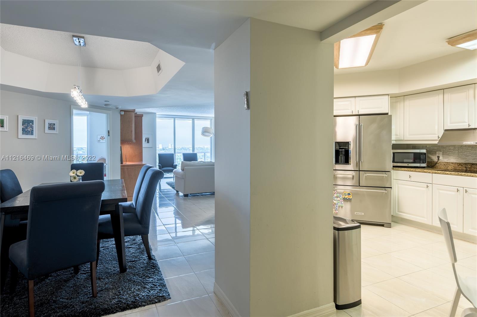 Dining, living, and kitchen.