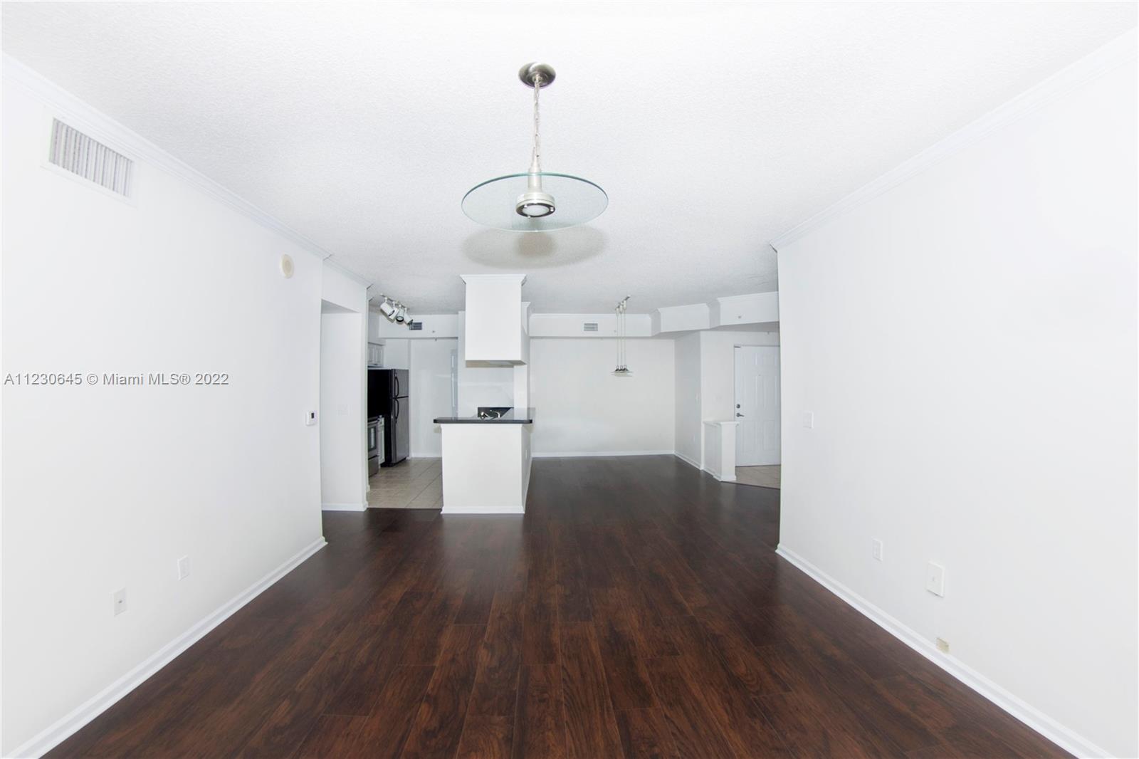 Photo of 17100 Bay Rd #1215, Sunny Isles Beach, Florida, 33160 - Living/Dining Empty