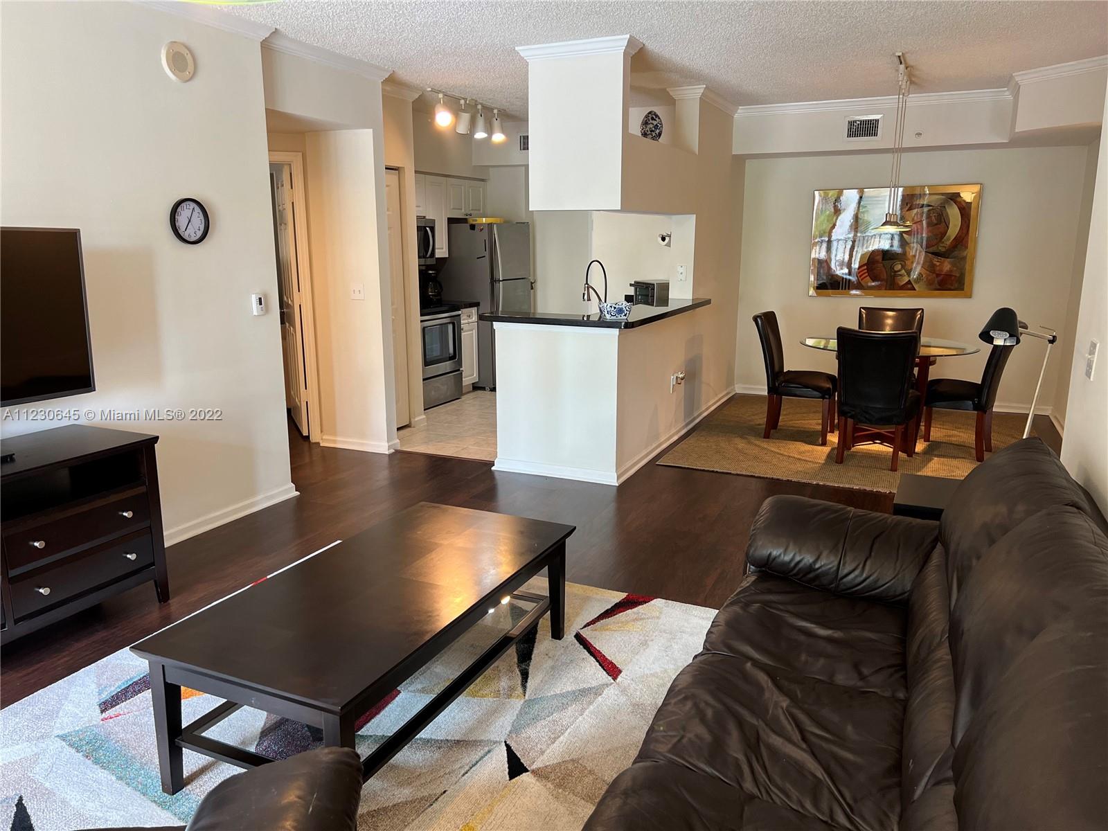 Photo of 17100 Bay Rd #1215, Sunny Isles Beach, Florida, 33160 - Living/Dining w/furniture