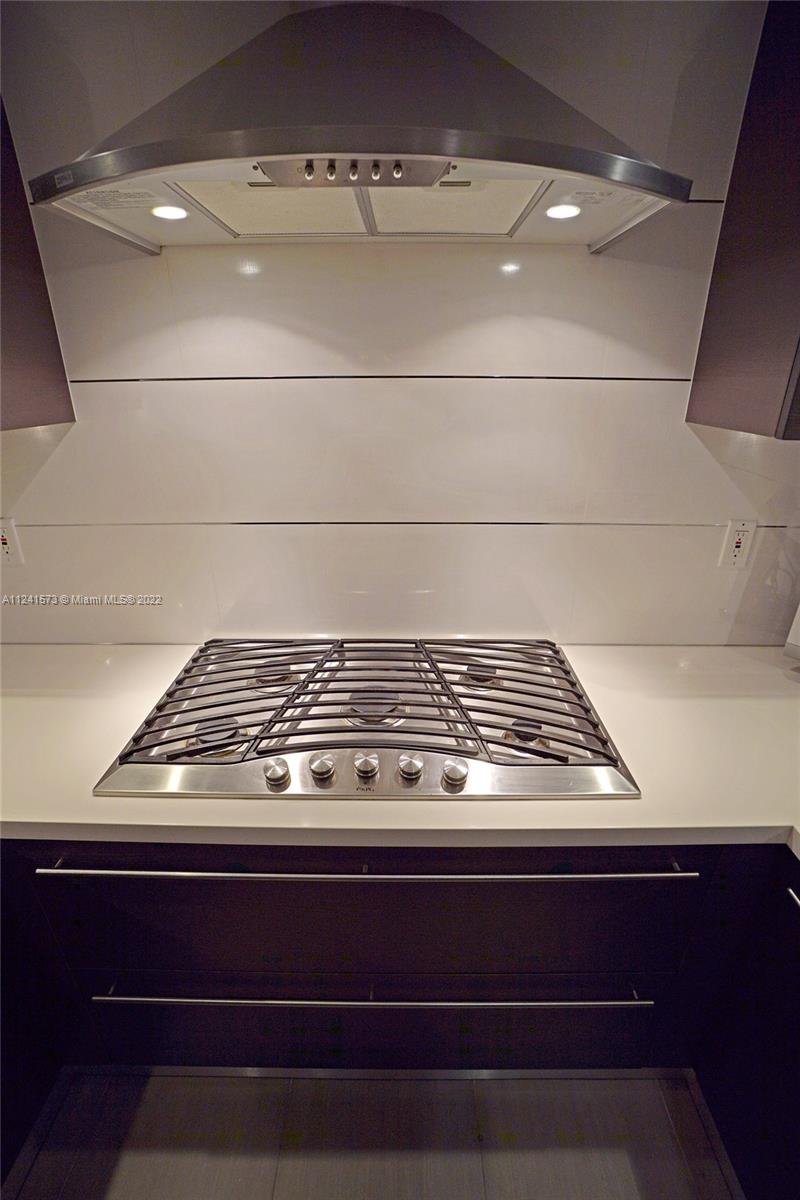 Photo of 2030 Ocean Dr #423, Hallandale Beach, Florida, 33009 - Gas stainless steal kitchen stove.