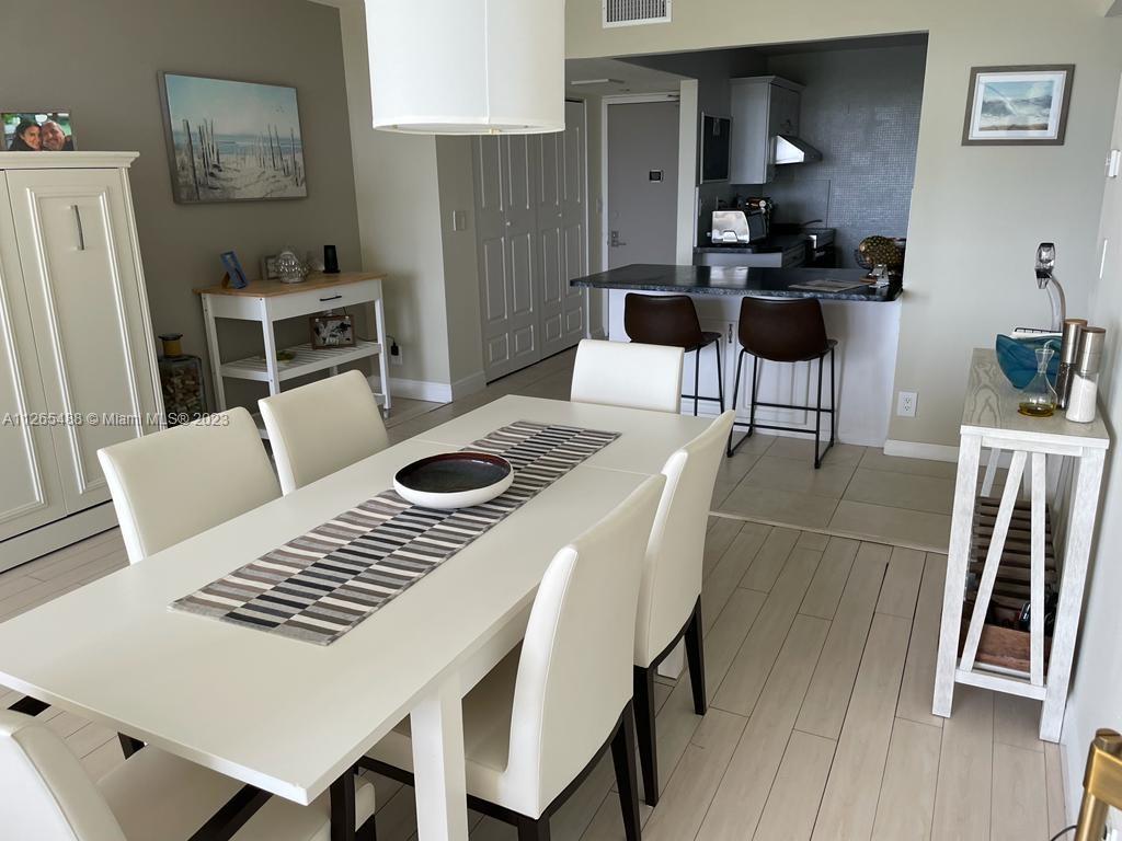 Photo of 20301 Country Club Dr #1623, Aventura, Florida, 33180 - dinning area, kitchen, murphy bed and hall closet. Very spacious