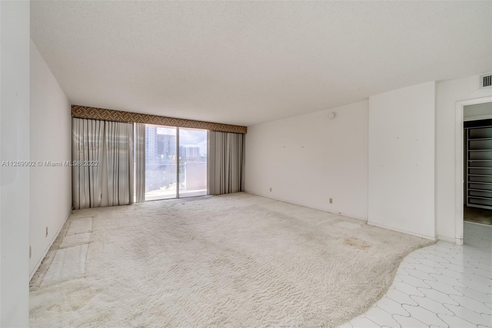 Photo of 1865 Ocean Dr #4F, Hallandale Beach, Florida, 33009 - Living room area.