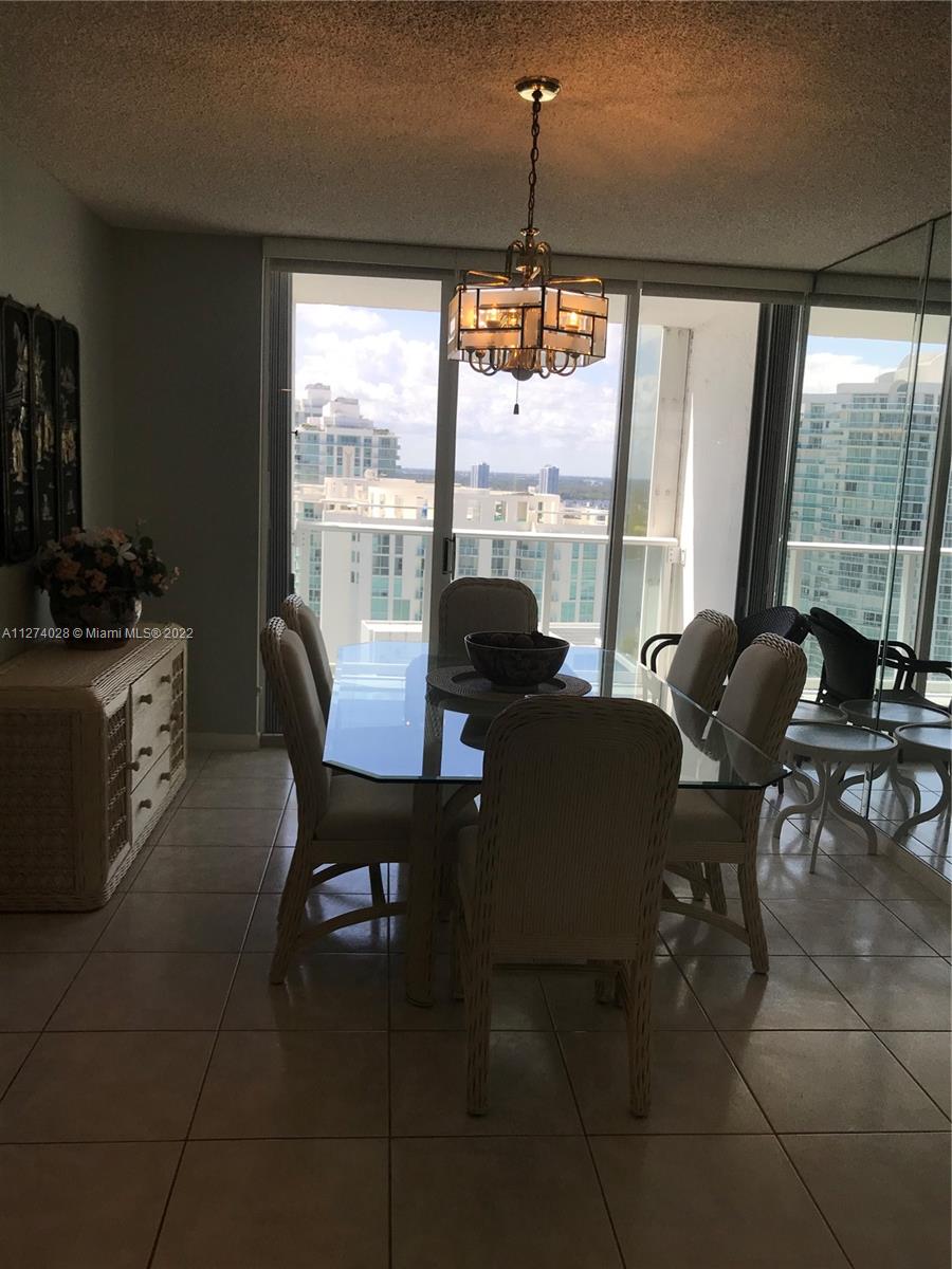 Photo of 16485 Collins Ave #2538, Sunny Isles Beach, Florida, 33160 - Dining Room with west city view from second balcony