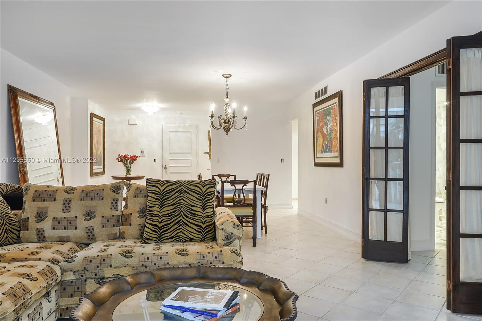 Photo of 9801 Collins Ave #5T, Bal Harbour, Florida, 33154 - Living area looking the door entrance