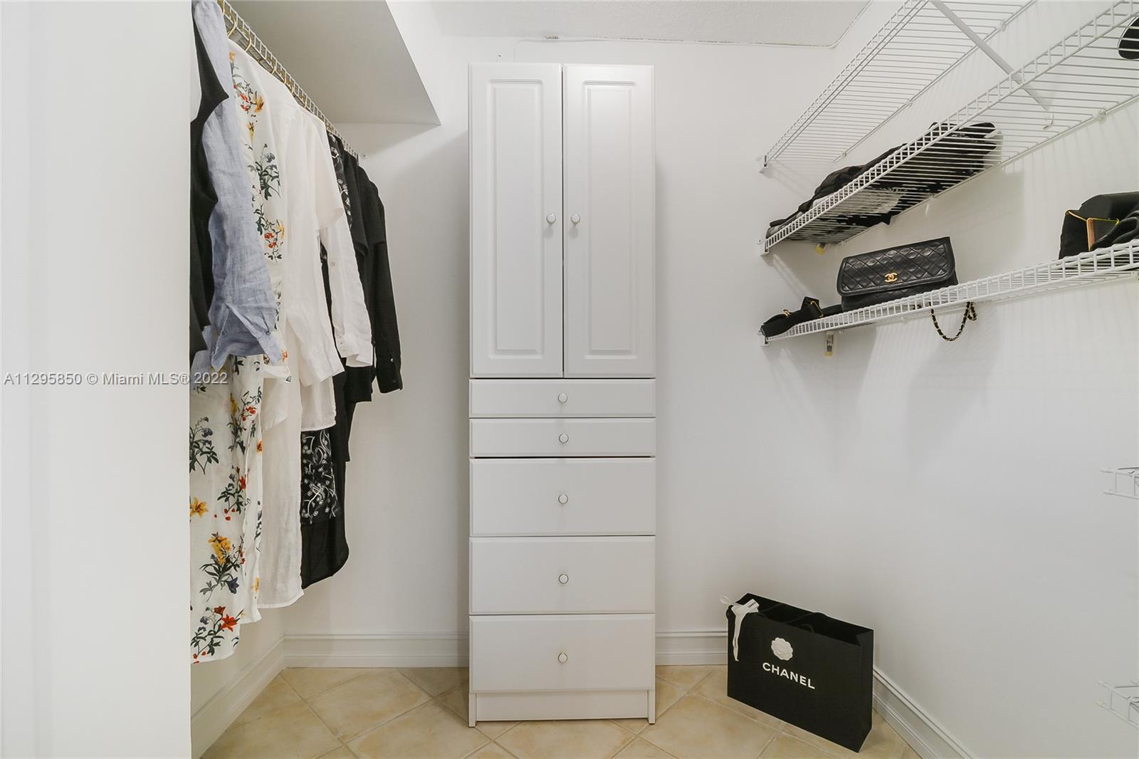 Photo of 9801 Collins Ave #5T, Bal Harbour, Florida, 33154 - Master walking closet and other 2 closets