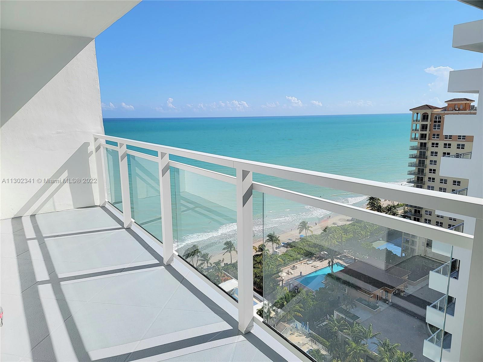 Photo of 2030 Ocean Dr #2018, Hallandale Beach, Florida, 33009 - New Glass Balcony Railing Maximizes the Ocean & Pool View