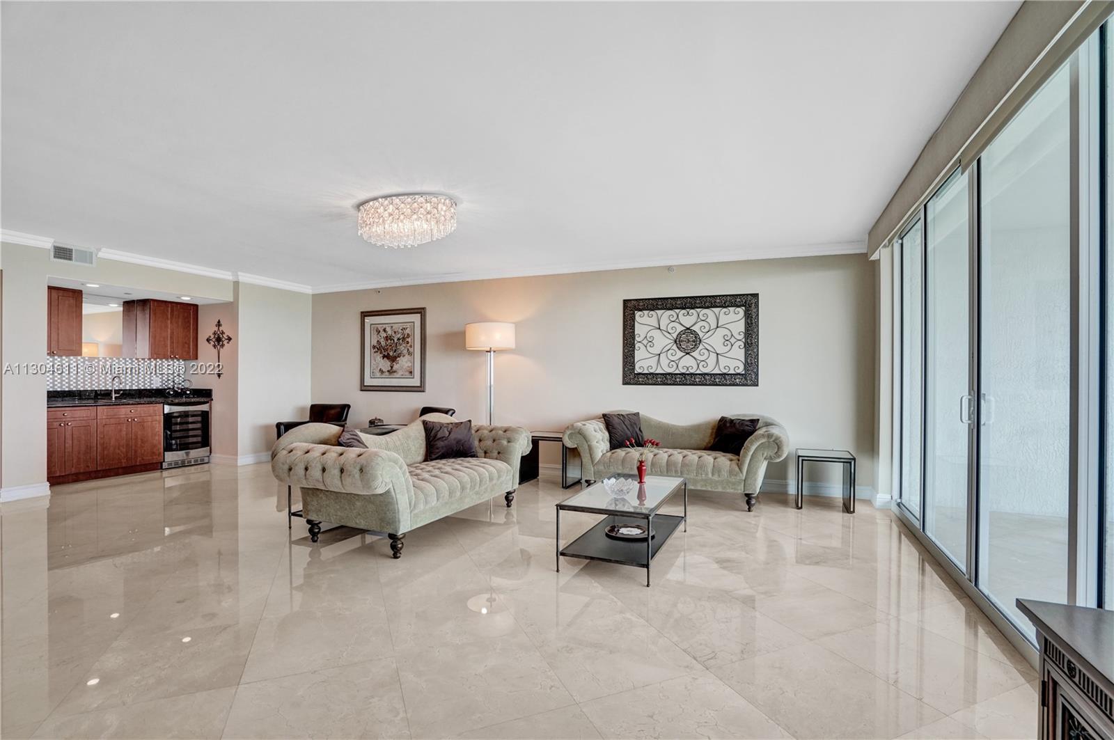 Photo of 20201 Country Club Dr #2702, Aventura, Florida, 33180 - Spacious living room and detail of the marble floors.
