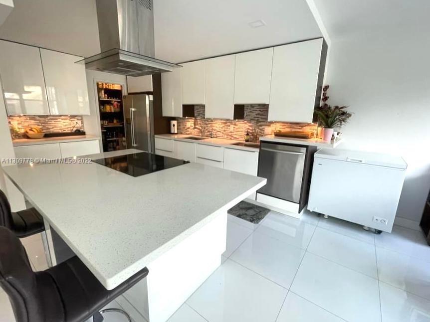 Photo of 2049 Ocean Dr #207, Hallandale Beach, Florida, 33009 - Open Kitchen/w SS Appliances & Island/Bar
