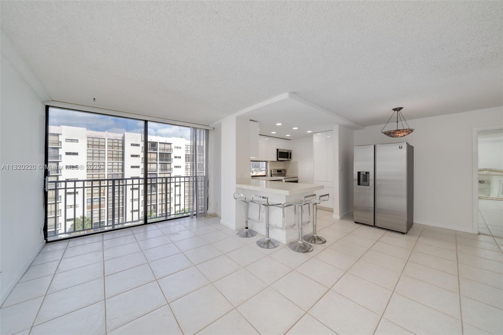 Photo of 16909 Bay Rd #806, Sunny Isles Beach, Florida, 33160 - Open Plan Kitchen with Recessed Lighting