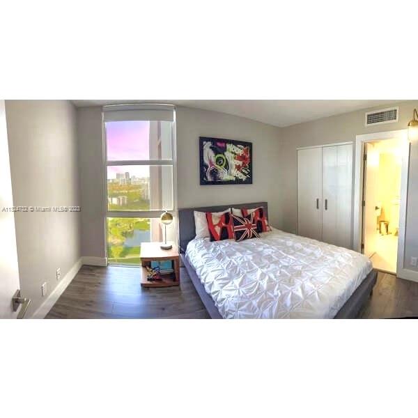 Photo of 20301 Country Club Dr #2522, Aventura, Florida, 33180 - 2nd Bedroom is brightly lighted with additional radiant views from triple pane private window.