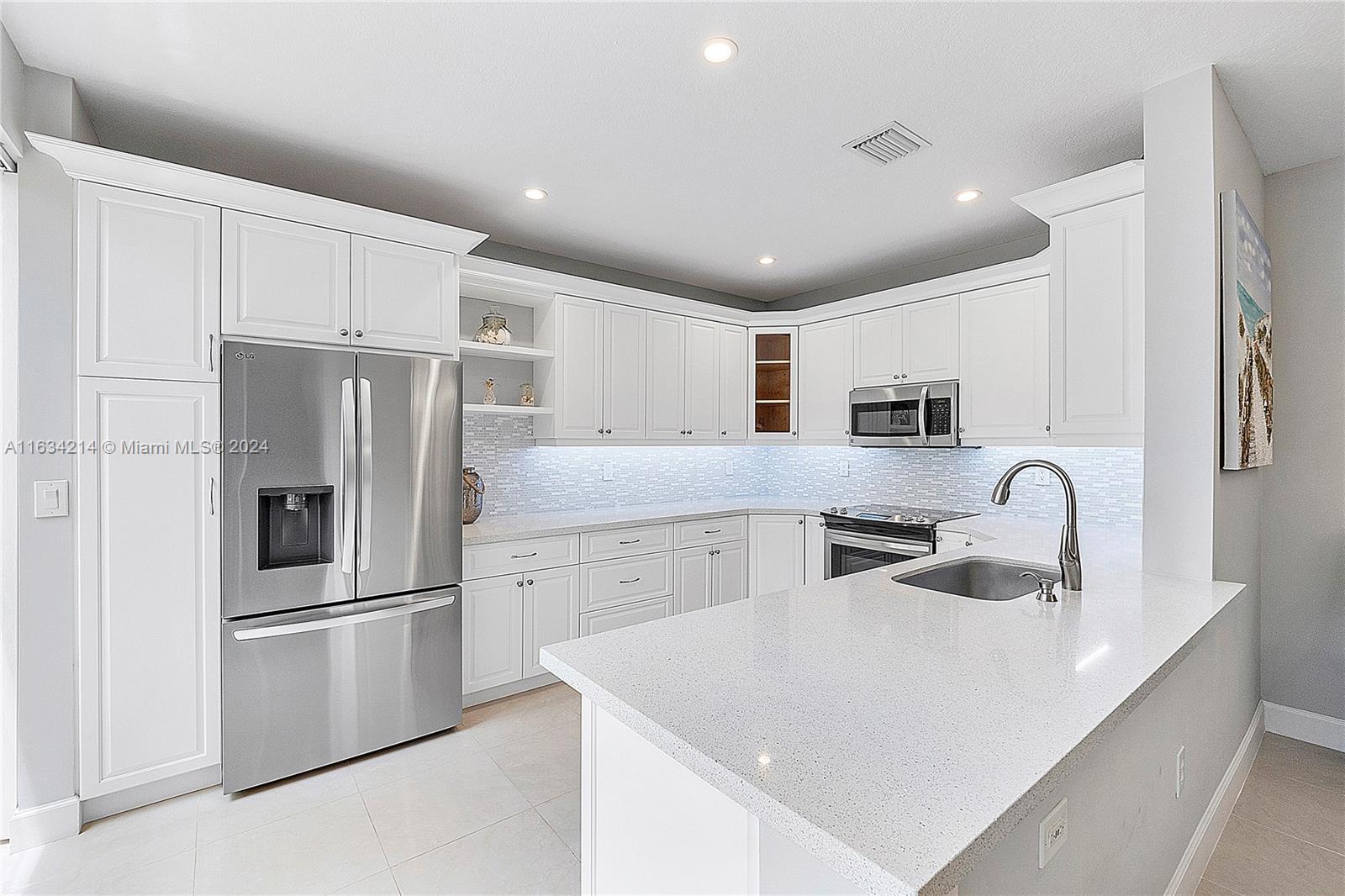 Chefs Kitchen with Wood Shaker, Soft-Close Cabinets and Drawers with quartz counters