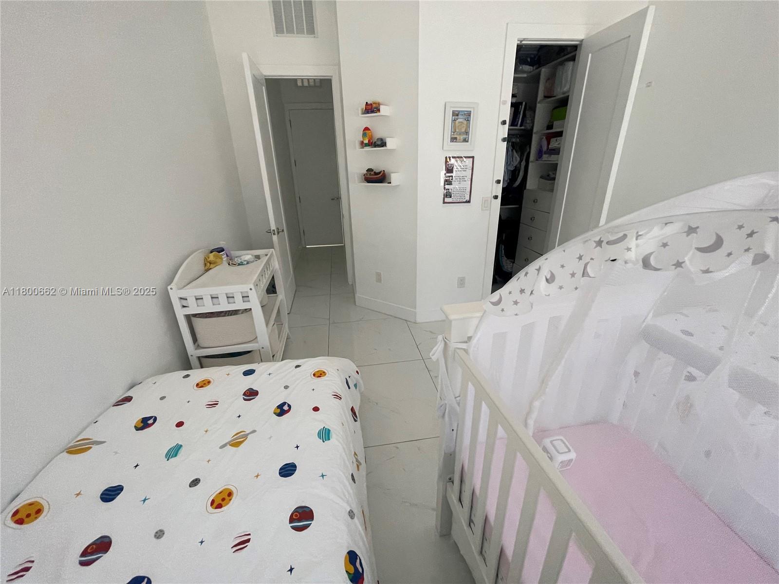 Photo of 2751 Ocean Dr  #208N, Hollywood, Florida, 33019 - Master bedroom, walk-in closet